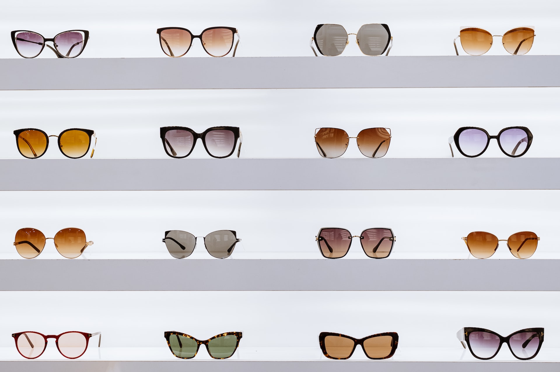 various glasses styles on shelves. Eyeglasses have evolved to become a fashion statement
